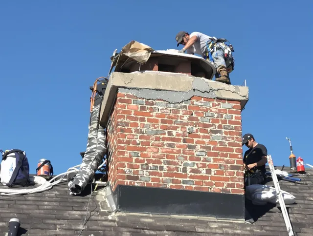 North Tustin Chimney Sweep installing a custom chimney crown in North Tustin, CA